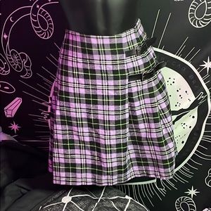 Purple and green pleated skirt with buckles